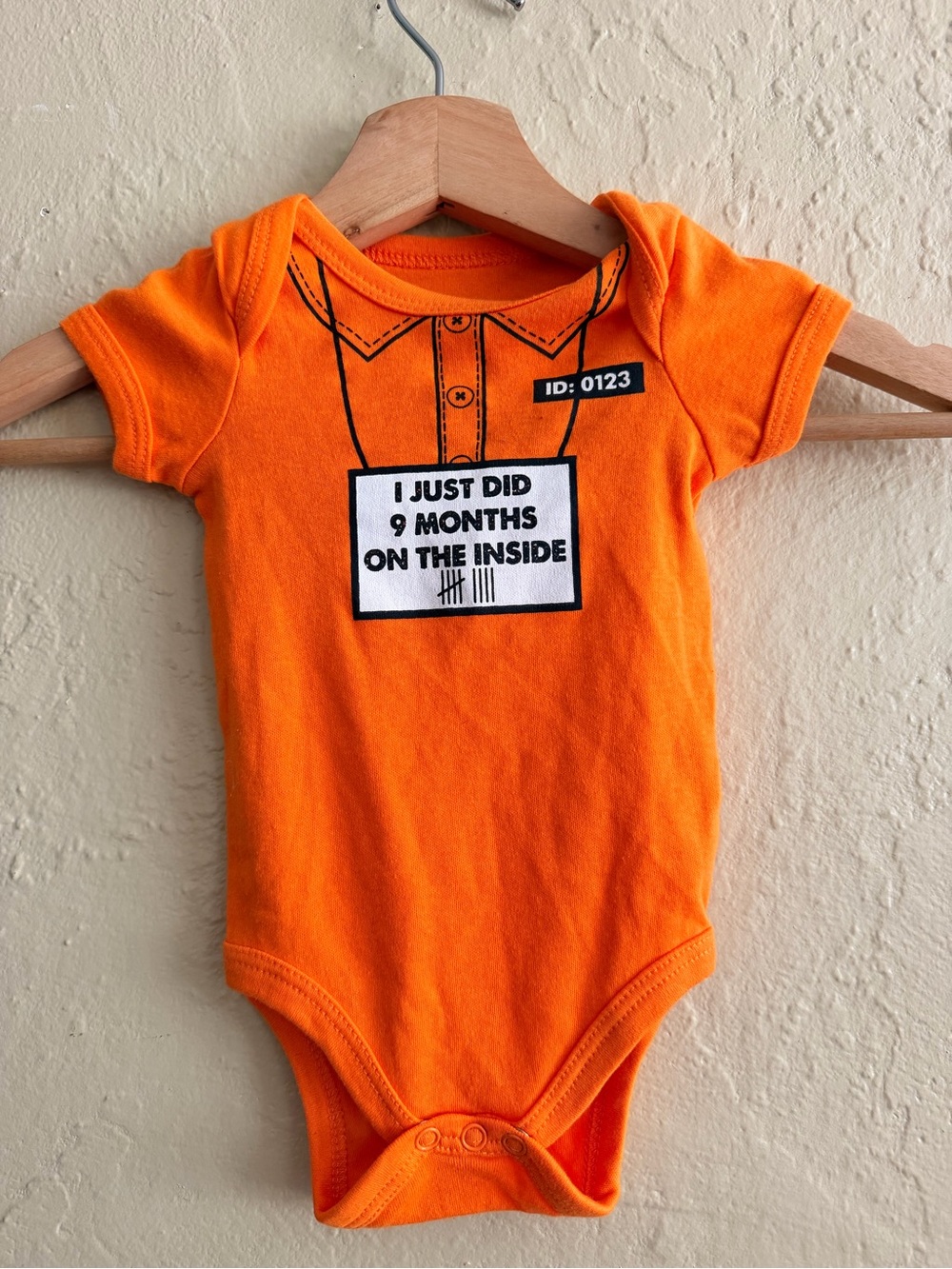 Swiggles Orange Graphic Baby One-Piece Bodysuit - 'I Just Did 9 Months'